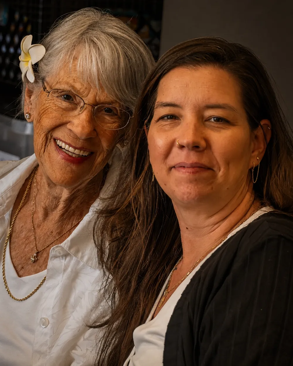 Two longtime Space Coast Symphony Orchestra friends together at a reception